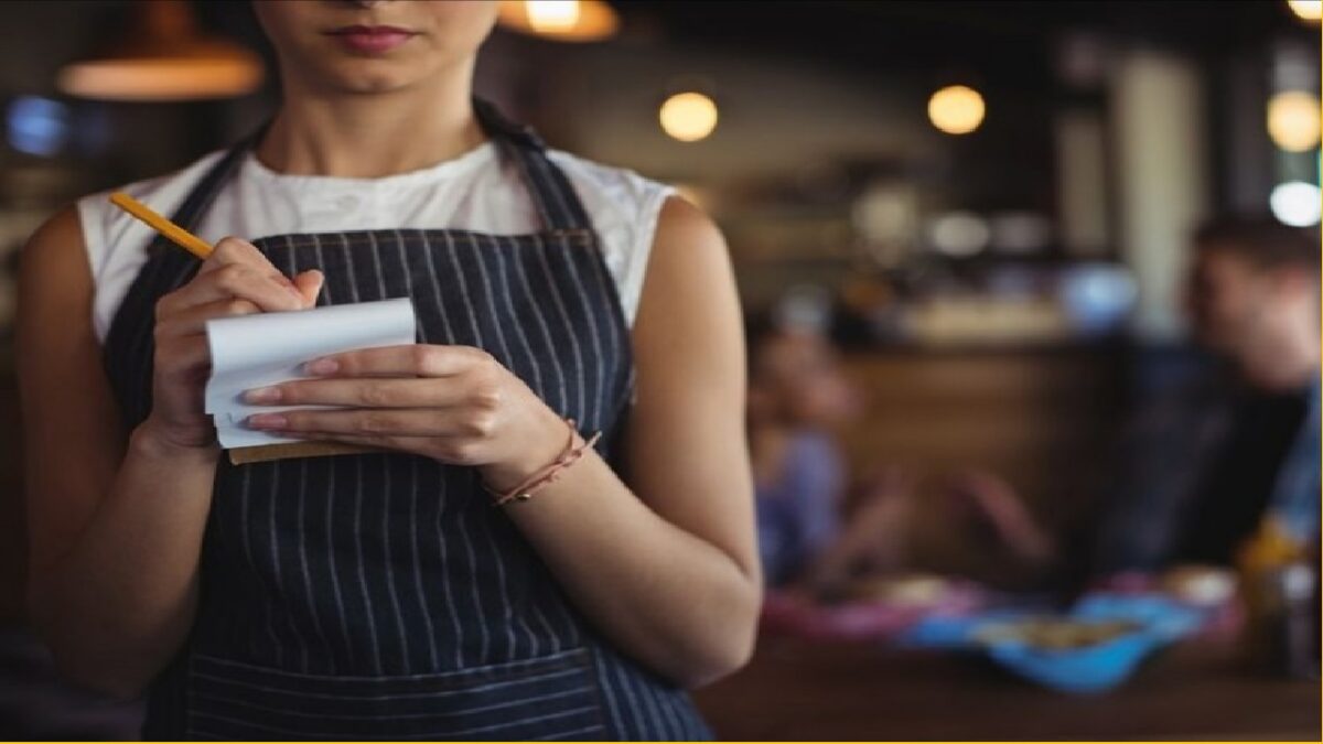 French Maid Waitress Serves Food To Customers On Knees